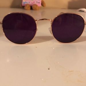 Sun glasses with purple lenses